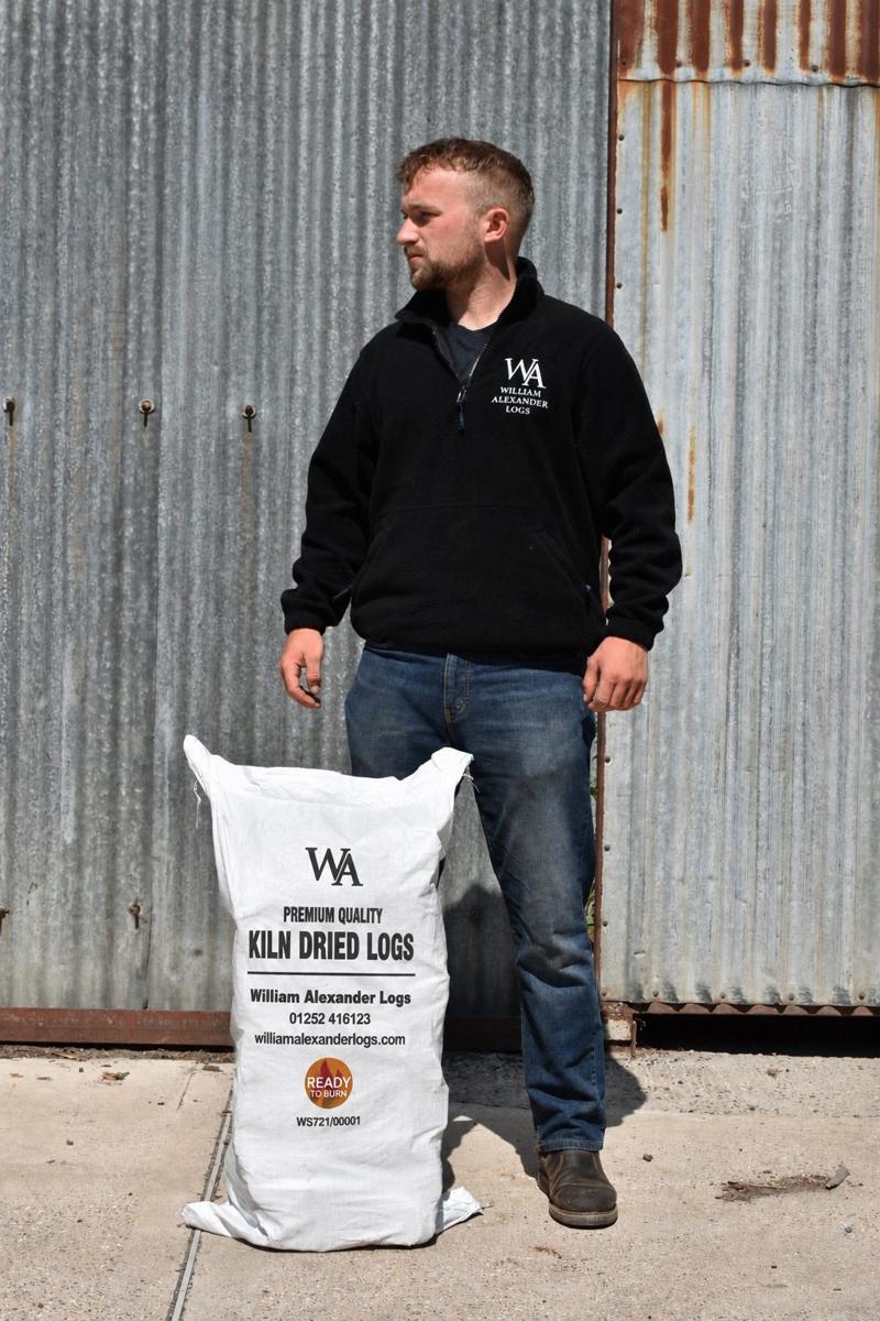 One of the William Alexander team at the yard with an Easy Bag of kiln-dried logs