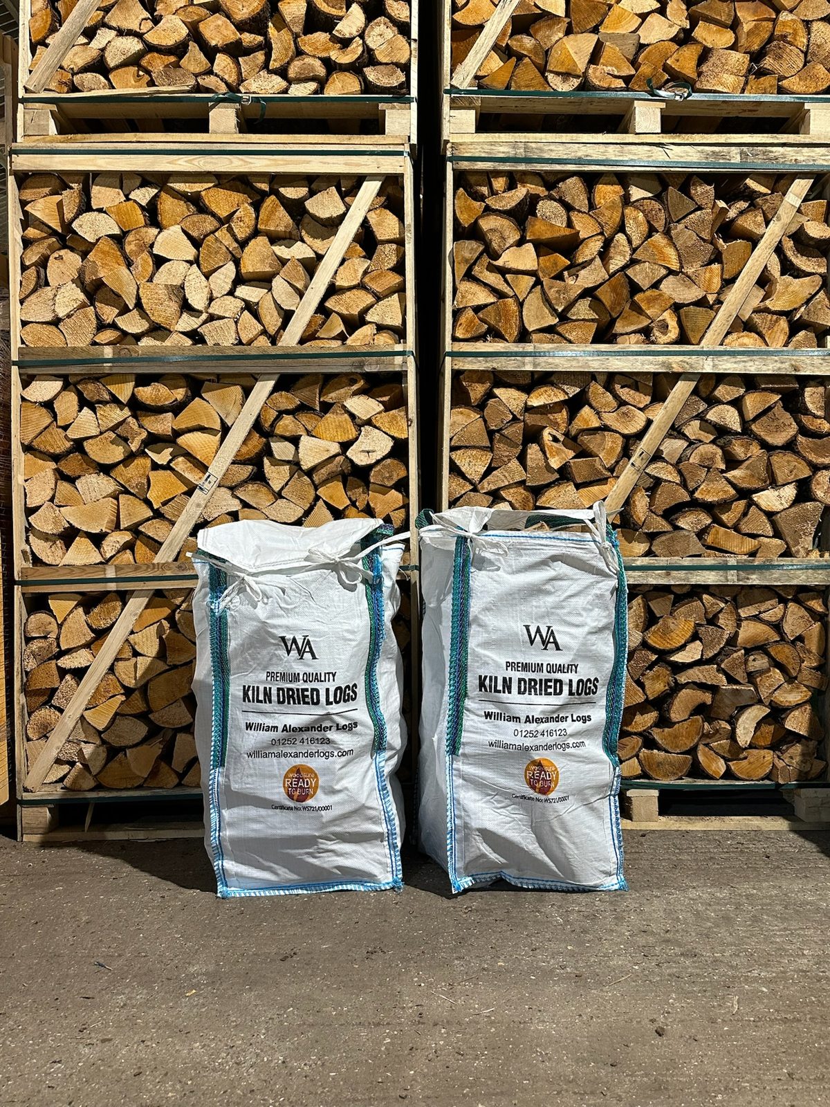 Two barrow bags packed and ready in front of the towering drying crates at the yard